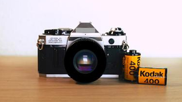 Vintage analogue film camera and photography equipment close-up