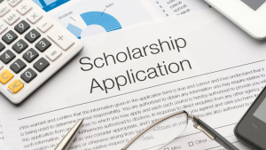 Scholarship application form graphic with pen and documents