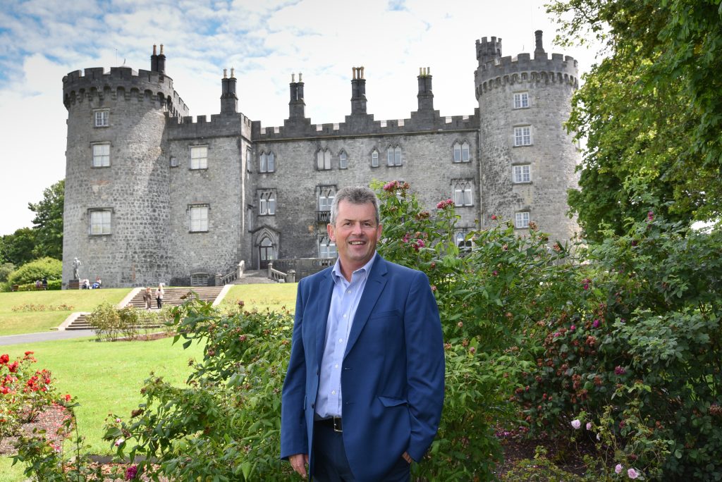 Historic Irish castle surrounded by green landscape
